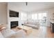 Spacious living area featuring a fireplace and sliding glass doors at 130 2Nd Se Ave, Atlanta, GA 30317