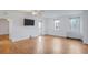 Bright living room with hardwood floors and a ceiling fan at 300 W Peachtree Ne St # 23C, Atlanta, GA 30308