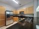 Modern kitchen with stainless steel appliances and granite countertops at 870 Mayson Turner Nw Rd # 1228, Atlanta, GA 30314