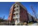 Brick apartment building with balconies and ample parking at 870 Mayson Turner Nw Rd # 1228, Atlanta, GA 30314