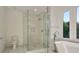 Spa-like bathroom with a large walk-in shower and soaking tub at 2194 Bristol Cove # 13, Chamblee, GA 30341