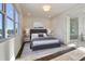Bright bedroom with hardwood floors and ensuite bathroom access at 2194 Bristol Cove # 13, Chamblee, GA 30341