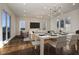 Modern dining area with a large table and access to a balcony at 2194 Bristol Cove # 13, Chamblee, GA 30341