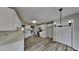 Modern kitchen with white cabinets and quartz countertops at 101 Hickory Leaf Ln, Acworth, GA 30101