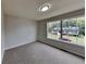 Spacious bedroom with a window offering backyard views at 101 Hickory Leaf Ln, Acworth, GA 30101