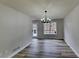 Bright dining room features hardwood floors and chandelier at 101 Hickory Leaf Ln, Acworth, GA 30101