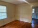 Bedroom with hardwood floors and ample closet space at 6848 Church St, Lithonia, GA 30058