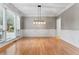 Bright dining room with hardwood floors and wainscoting at 4510 Jenkins Way, Douglasville, GA 30135