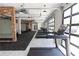 Modern gym featuring a row of treadmills and large windows at 1140 Larkin Dr # 30, Buford, GA 30518