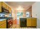 Bright kitchen with stainless steel appliances and access to a patio at 1121 Whisper Wind Dr, Mcdonough, GA 30253