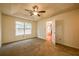 Spacious bedroom with carpeted floor and ceiling fan at 1121 Whisper Wind Dr, Mcdonough, GA 30253