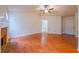 Bright living room with hardwood floors, fireplace, and vaulted ceiling at 1121 Whisper Wind Dr, Mcdonough, GA 30253