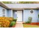 Front door entrance with landscaping at 1121 Whisper Wind Dr, Mcdonough, GA 30253