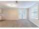 Spacious living area with neutral carpet and French doors at 3575 Bright Star Rd, Douglasville, GA 30135