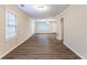 Spacious living room featuring hardwood floors and neutral walls at 3575 Bright Star Rd, Douglasville, GA 30135