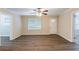 Living room with hardwood floors, ceiling fan and access to other rooms at 3575 Bright Star Rd, Douglasville, GA 30135