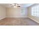 Bright bedroom with neutral carpeting and ample natural light at 3575 Bright Star Rd, Douglasville, GA 30135