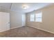 Spacious bedroom with neutral walls and carpeted floor at 3575 Bright Star Rd, Douglasville, GA 30135