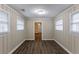 Cozy bedroom with hardwood floors and neutral walls at 3575 Bright Star Rd, Douglasville, GA 30135