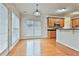 Eat-in kitchen with hardwood floors and wood cabinets at 401 Highway 279, Fayetteville, GA 30214