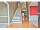 Hardwood floors and staircase in the two-story foyer at 401 Highway 279, Fayetteville, GA 30214