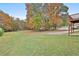 Large backyard with wooded area at 401 Highway 279, Fayetteville, GA 30214