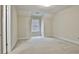 Simple bedroom with carpeted floors and a window at 401 Highway 279, Fayetteville, GA 30214