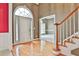 Two-story foyer with hardwood floors and staircase at 401 Highway 279, Fayetteville, GA 30214
