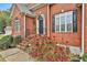 Front entrance with stairs, landscaping and brick accents at 401 Highway 279, Fayetteville, GA 30214