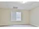 Empty basement room with carpeted floor and window at 401 Highway 279, Fayetteville, GA 30214