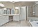 Large bathroom with double vanity and bathtub at 401 Highway 279, Fayetteville, GA 30214