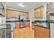 Spacious kitchen featuring stainless steel appliances and hardwood floors at 401 Highway 279, Fayetteville, GA 30214