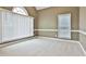 Carpeted room with large window and neutral walls at 401 Highway 279, Fayetteville, GA 30214