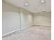 Empty basement room with carpeted floor at 401 Highway 279, Fayetteville, GA 30214
