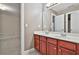 Double vanity bathroom with wood cabinets at 401 Highway 279, Fayetteville, GA 30214