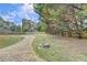 Backyard with fire pit and a spacious grassy area at 39 Legendary Dr, Hoschton, GA 30548