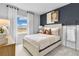 Bright bedroom with a window and neutral tones at 3621 Olive Grove Ln, Covington, GA 30016