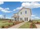 Two-story house with white siding, green door, landscaping, and a concrete driveway at 3621 Olive Grove Ln, Covington, GA 30016