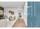 Bright entryway with light wood floors, and a view into the living area at 3621 Olive Grove Ln, Covington, GA 30016