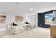 Bright loft with sectional sofa, offering versatile living space at 3621 Olive Grove Ln, Covington, GA 30016