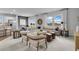 Open concept living room with a view of the kitchen and dining area at 3621 Olive Grove Ln, Covington, GA 30016