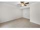 Spacious bedroom with ceiling fan and tile flooring at 1143 Cedar Log Pl, Austell, GA 30168