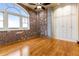 Secondary bedroom with hardwood floors and built-in storage at 3180 Mathieson Ne Dr # 1401, Atlanta, GA 30305