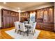 Bright dining room with built-in hutch and hardwood floors at 3180 Mathieson Ne Dr # 1401, Atlanta, GA 30305