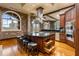 Island kitchen with dark wood cabinets and ample storage at 3180 Mathieson Ne Dr # 1401, Atlanta, GA 30305