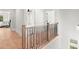 Open concept second floor hallway with hardwood floors at 3794 Wynn Walk, Brookhaven, GA 30341
