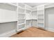 Spacious walk-in closet with ample shelving and hanging rods at 3794 Wynn Walk, Brookhaven, GA 30341