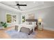 Spacious primary bedroom with hardwood floors and large windows at 3794 Wynn Walk, Brookhaven, GA 30341