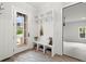 Bright entryway with built-in bench seating and storage at 3794 Wynn Walk, Brookhaven, GA 30341