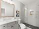 Contemporary bathroom with gray tile and a glass shower at 3794 Wynn Walk, Brookhaven, GA 30341